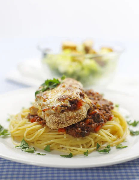 Parmigiana meal with caesar salad — Stock Photo, Image