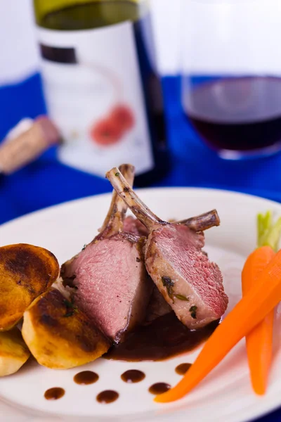 Lamb chop meal with wine — Stock Photo, Image
