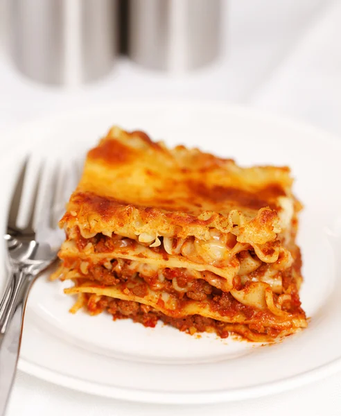 Fresh lasagna on white background — Stock Photo, Image