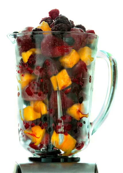 Frozen fruit in a pitcher — Stock Photo, Image