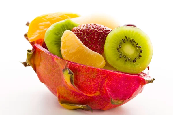 Fruktsallad i en mittenrutan pitahaya Royaltyfria Stockbilder