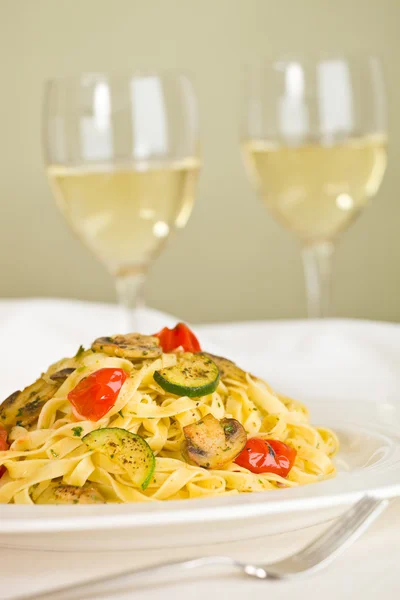 Tagliatelle and white wine Royalty Free Stock Images