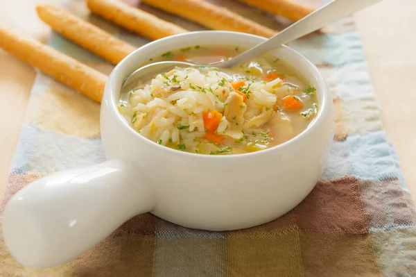 Курячий рисовий суп з хлібною паличкою Ліцензійні Стокові Фото