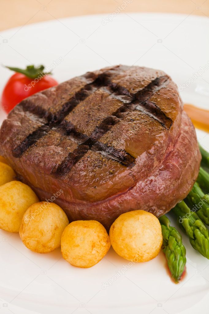 Tenderloin steak in a white plate