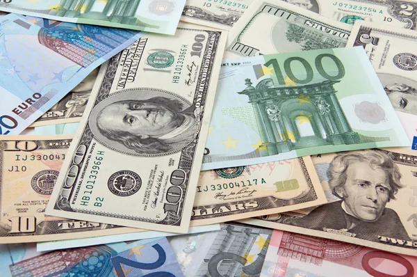 Pénz - a dollár és az euró — Stock Fotó