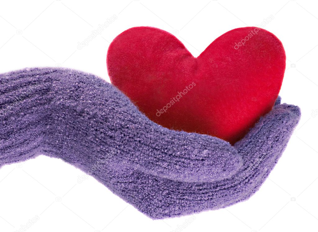 Heart in hand in blue glove