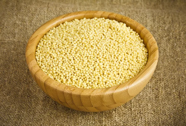 stock image Millet in a Serving Bowl on a Brown background