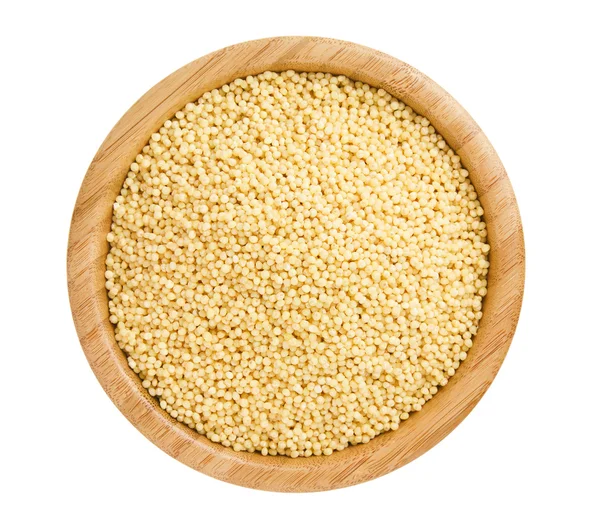 stock image Cleaned Millet in a Bamboo Bowl isolated on white background