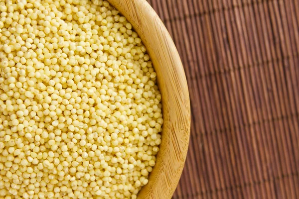 Cleaned Millet in a Serving Bowl on a Bamboo Mat — Stock Photo, Image