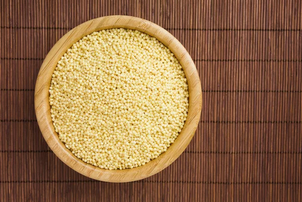 stock image Cleaned Millet in a Serving Bowl on a Bamboo Mat