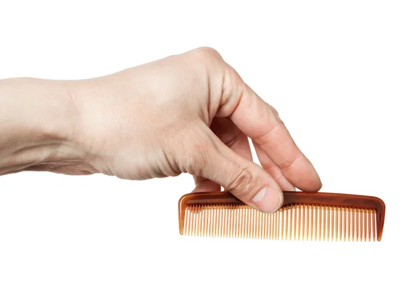 Hairbrush in een hand, het is geïsoleerd op de witte — Stockfoto