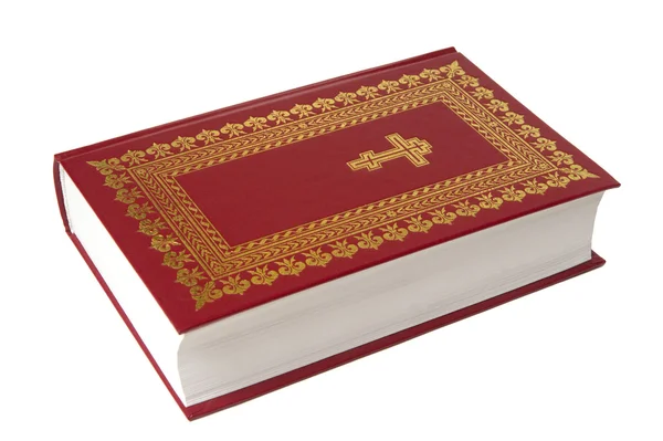 Красная библия, она изолирована на белом — стоковое фото