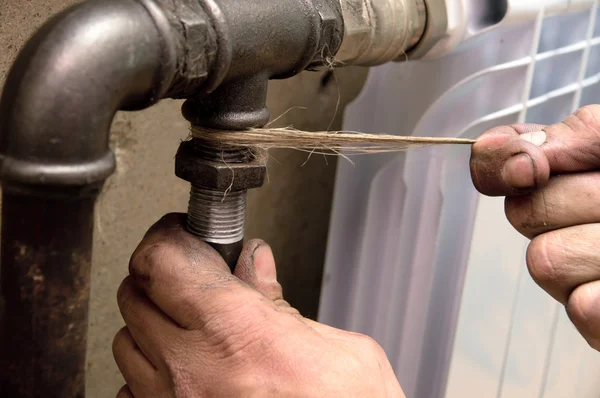 stock image Real photo of installation of a radiator