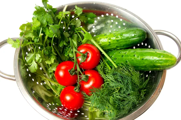 stock image Cucumbers. red tomatoes and green arugula in a metal pan