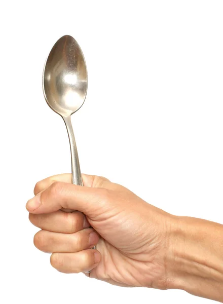 Spoon in a hand — Stock Photo, Image