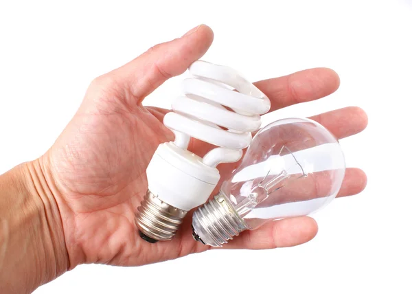 Elektrische lamp in een hand — Stockfoto