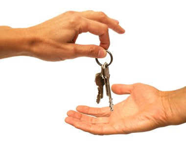 Two hands and keys on a white background clipart