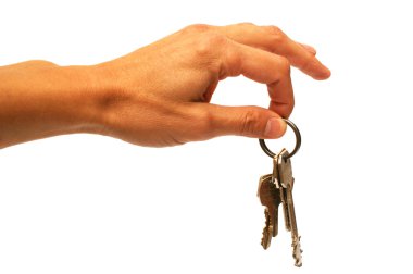 Hand and keys on a white background clipart