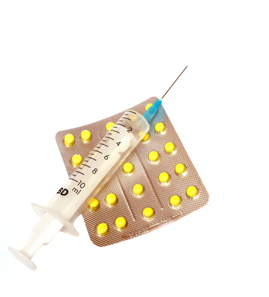 Tabletler ve enjektör — Stok fotoğraf