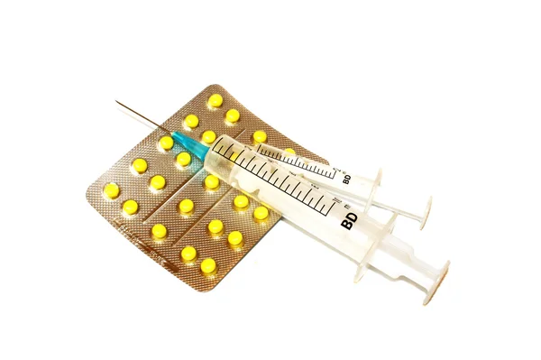 Tabletler ve enjektör — Stok fotoğraf