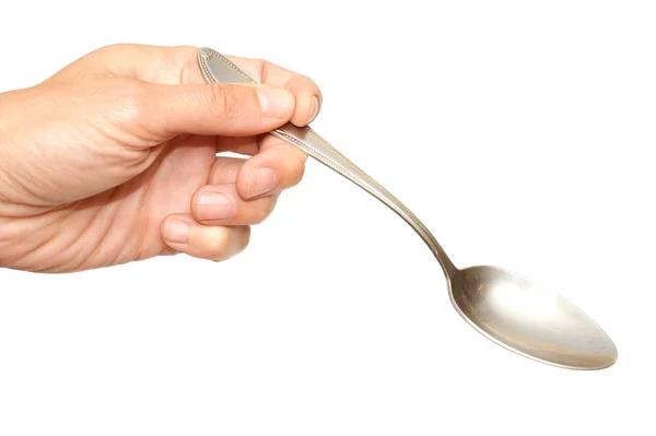 Spoon in a hand — Stock Photo, Image