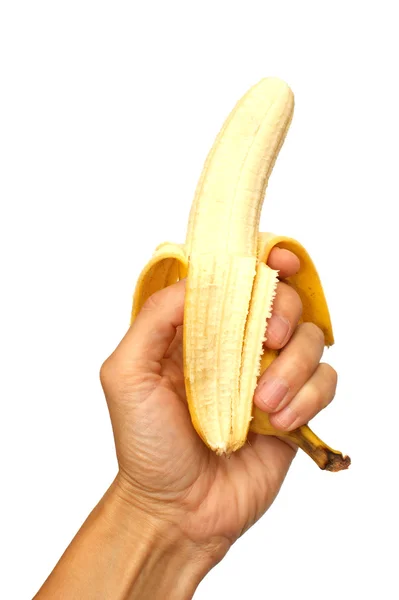 Человек, держащий банан на белом фоне — стоковое фото