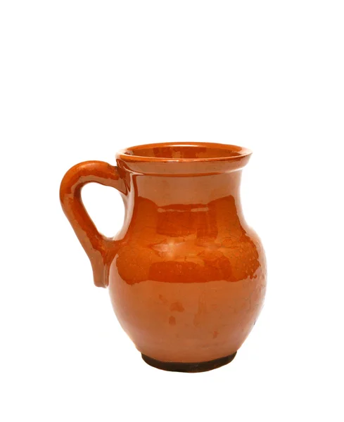 Clay jug on a white background Stock Image