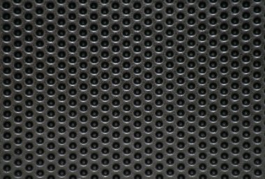 Photo of a natural perforated metal surface clipart