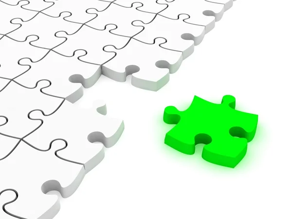 White jigsaw puzzles with one green piece — Stock Photo, Image