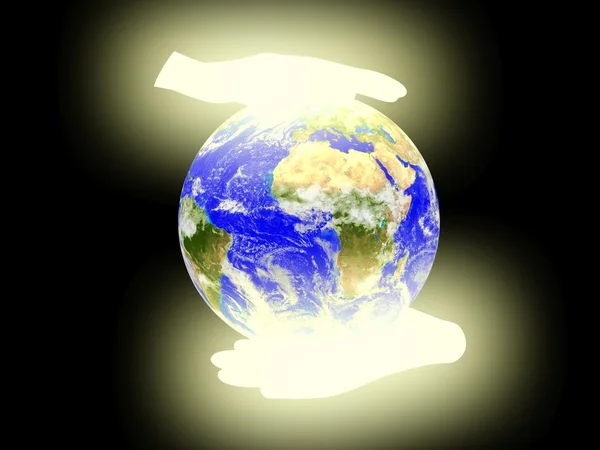 Planeta ziemia między dłonie — Zdjęcie stockowe