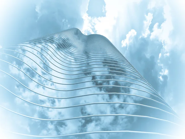 Современный небоскреб на фоне облаков — стоковое фото