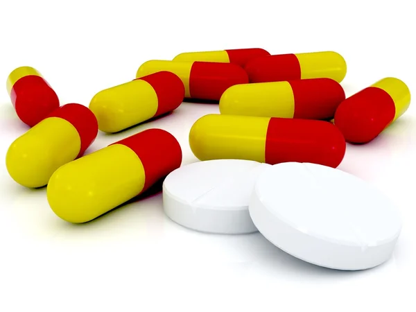 Красные желтые таблетки и белые таблетки .. — стоковое фото