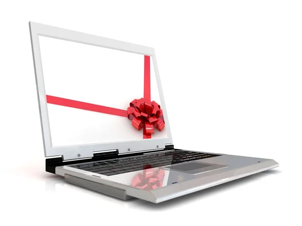 Un portátil con arco de envoltura de regalo y cinta — Foto de Stock