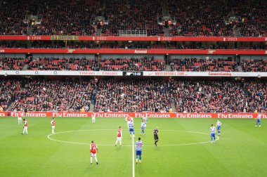 Arsenal playing QPR 31st Dec 2011 clipart