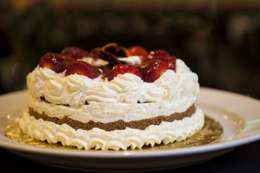 Whipped cream cake with strawberries clipart