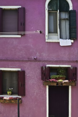 Colorful houses in Burano Italy clipart