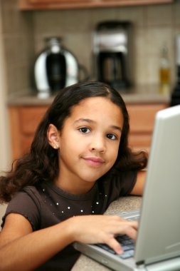 Child on Computer clipart