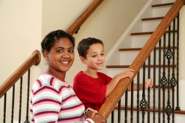 Mother and Children on Stairs clipart