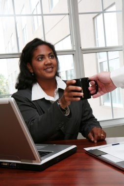 Businesswoman Getting Coffee clipart