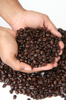 Coffee Beans Held in Hand clipart
