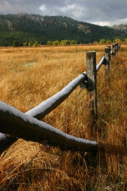 Wooden Fence Near Mountains clipart