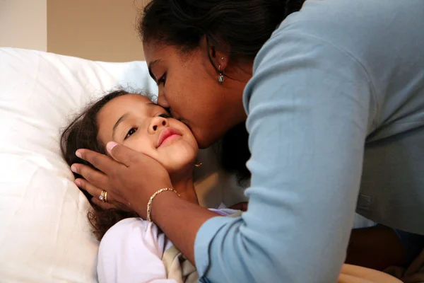 stock image Mom Tucking Child into Bed