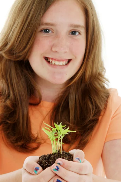Tonåring med växt — Stockfoto