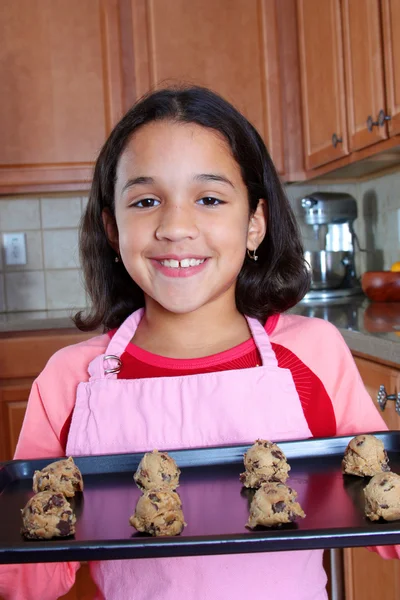 Menina com biscoitos — Fotografia de Stock