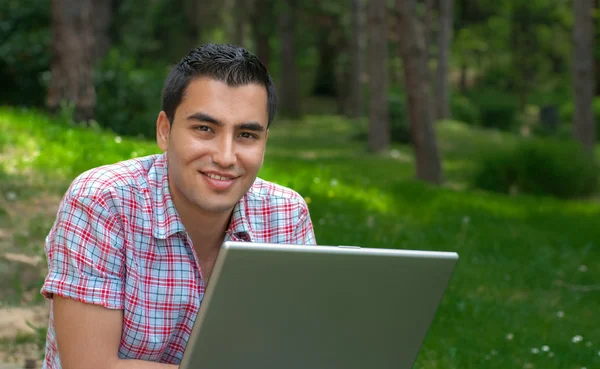 Young men with lap-top — Stock Photo, Image