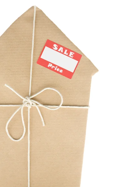 House Wrapped In Brown Paper With Sale Sticker — Stock Photo, Image