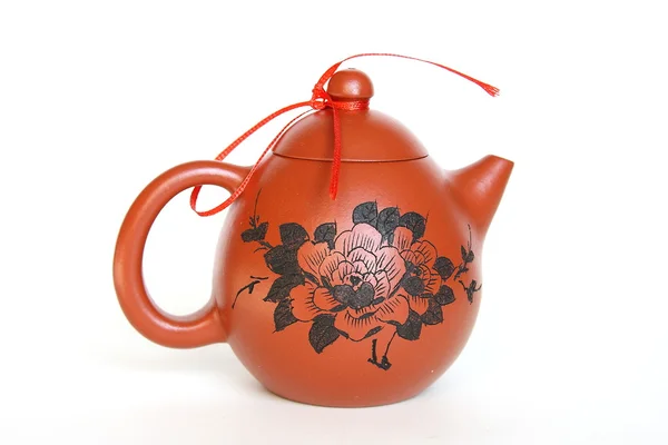 Clay teapot with flowers — Stock Photo, Image