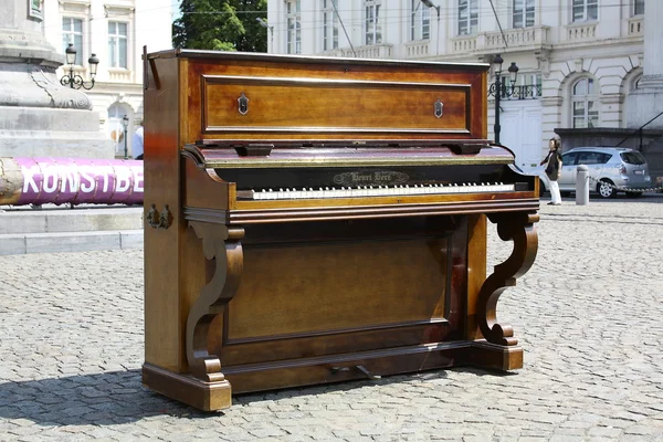 stock image Old piano on the area of Brussels