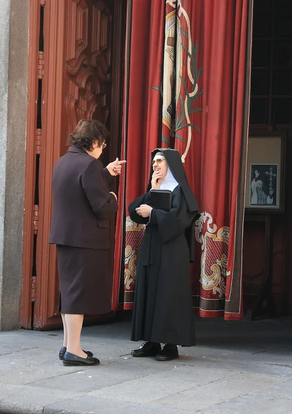 stock image Conversation with a nun