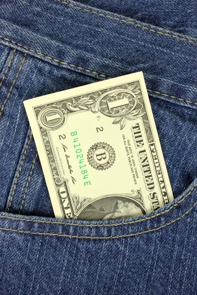 Een dollarbiljet in de zak — Stockfoto
